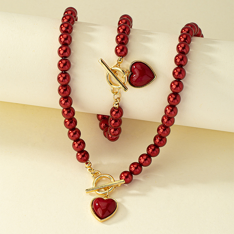 Elegante Glamour Señora Forma De Corazón Arílico Perla De Imitación Aleación Enchapado Chapado En Oro De 14 Quilates. Mujeres Pulsera Collar display picture 2