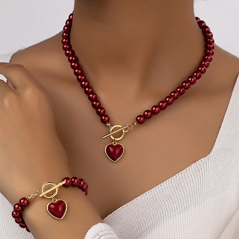 Elegant Glam Lady Heart Shape Arylic Imitation Pearl Alloy Plating 14k Gold Plated Women's Bracelets Necklace display picture 1