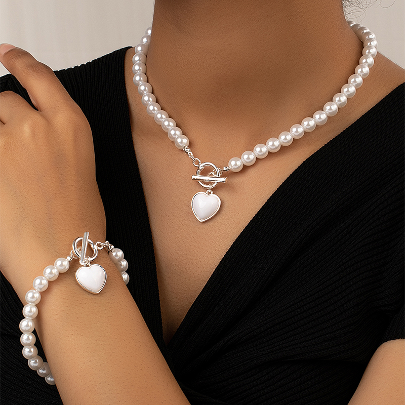 Elegant Glam Lady Heart Shape Arylic Imitation Pearl Alloy Plating 14k Gold Plated Women's Bracelets Necklace display picture 3