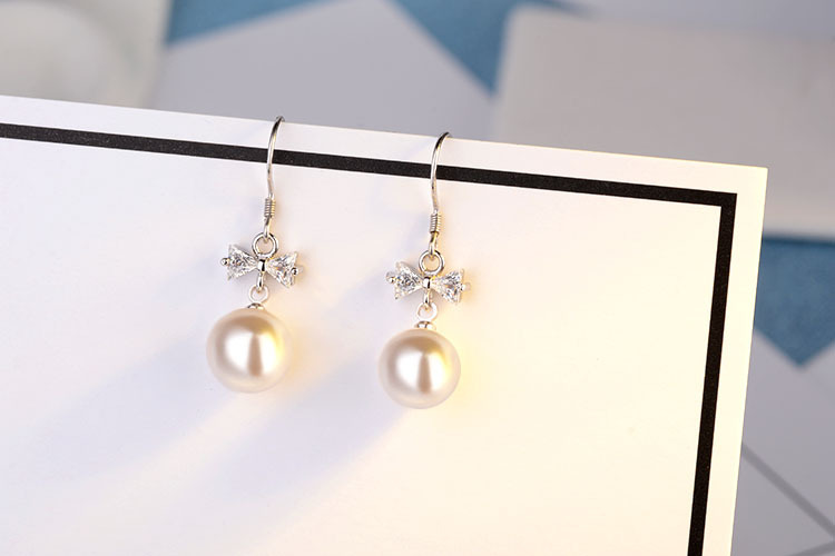 1 Pair Elegant Bow Knot Plating Inlay Copper Artificial Pearls Zircon White Gold Plated Drop Earrings display picture 6
