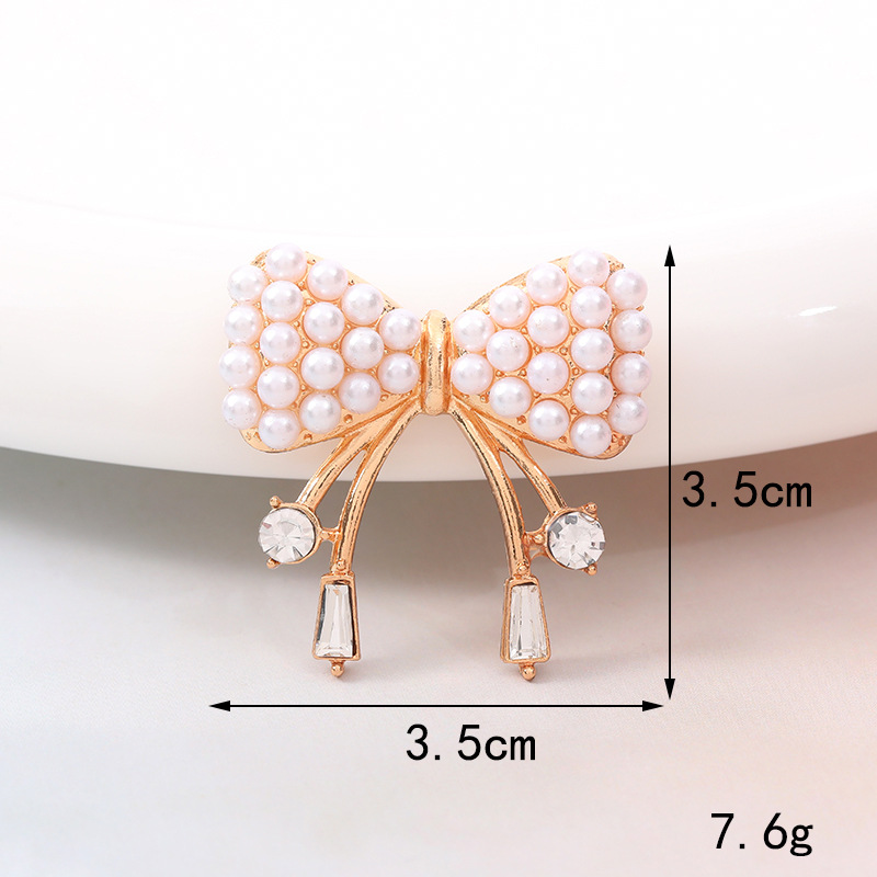 Sucré Noeud D'arc Métal Placage Incruster Perles Artificielles Diamant Artificiel Bijoux Accessoires display picture 4