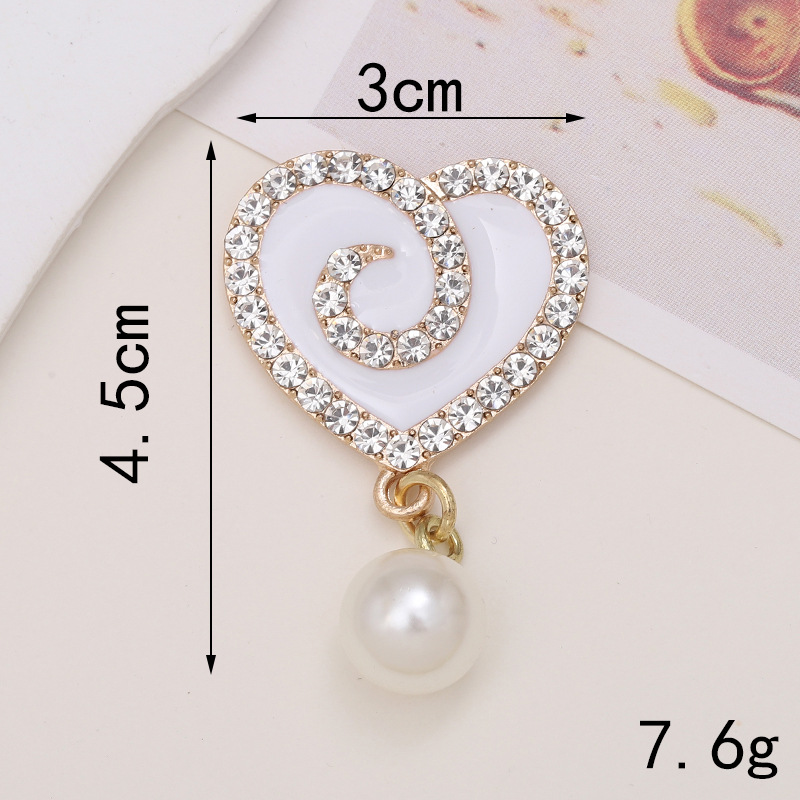Sweet Heart Shape Metal Plating Inlay Artificial Diamond Jewelry Accessories display picture 1