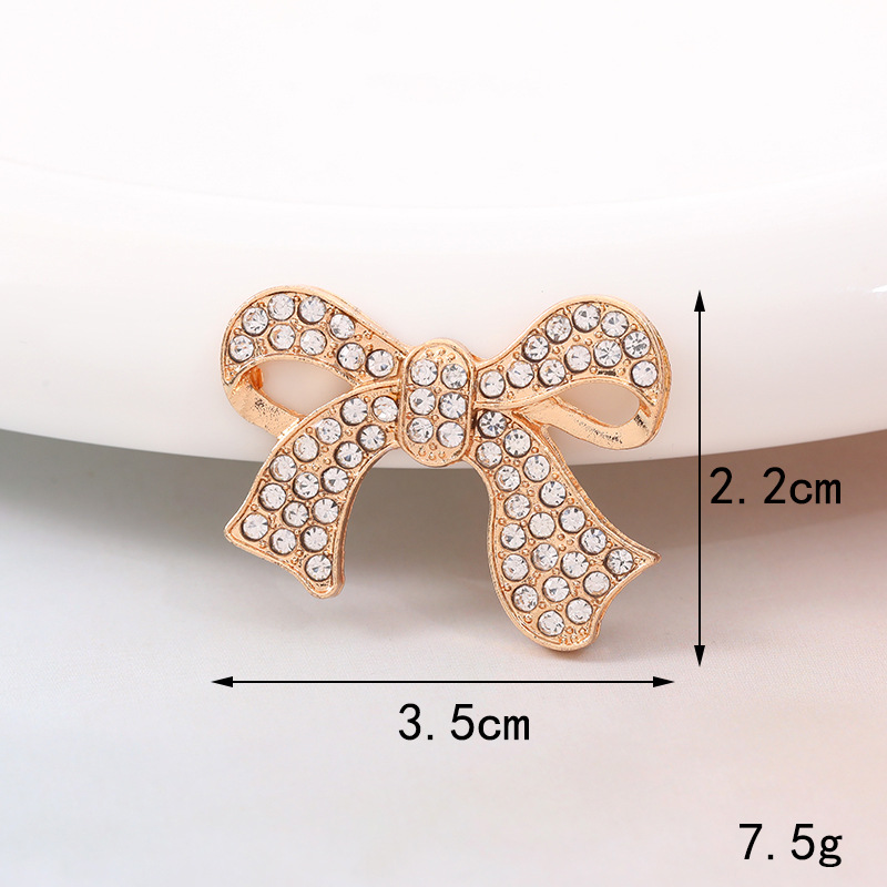 Sweet Bow Knot Metal Plating Inlay Artificial Pearls Artificial Diamond Jewelry Accessories display picture 10
