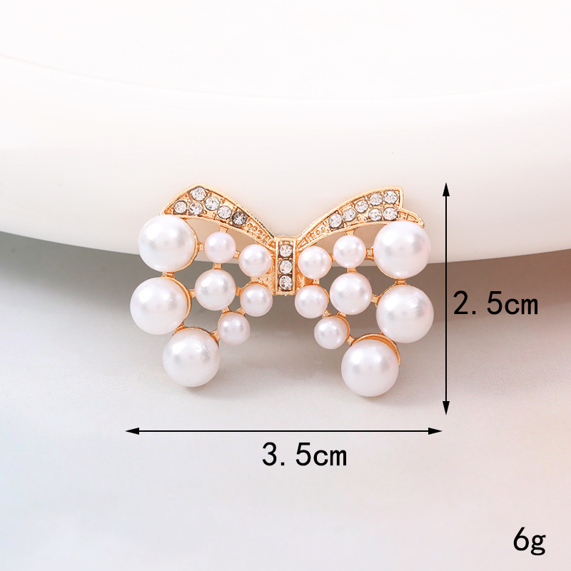 Sucré Noeud D'arc Métal Placage Incruster Perles Artificielles Diamant Artificiel Bijoux Accessoires display picture 11