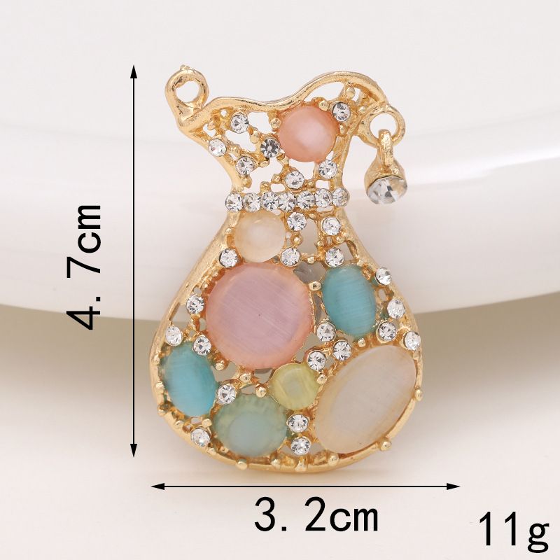 Basic Perfume Bottle Metal Plating Inlay Artificial Gemstones Artificial Pearls Jewelry Accessories display picture 9