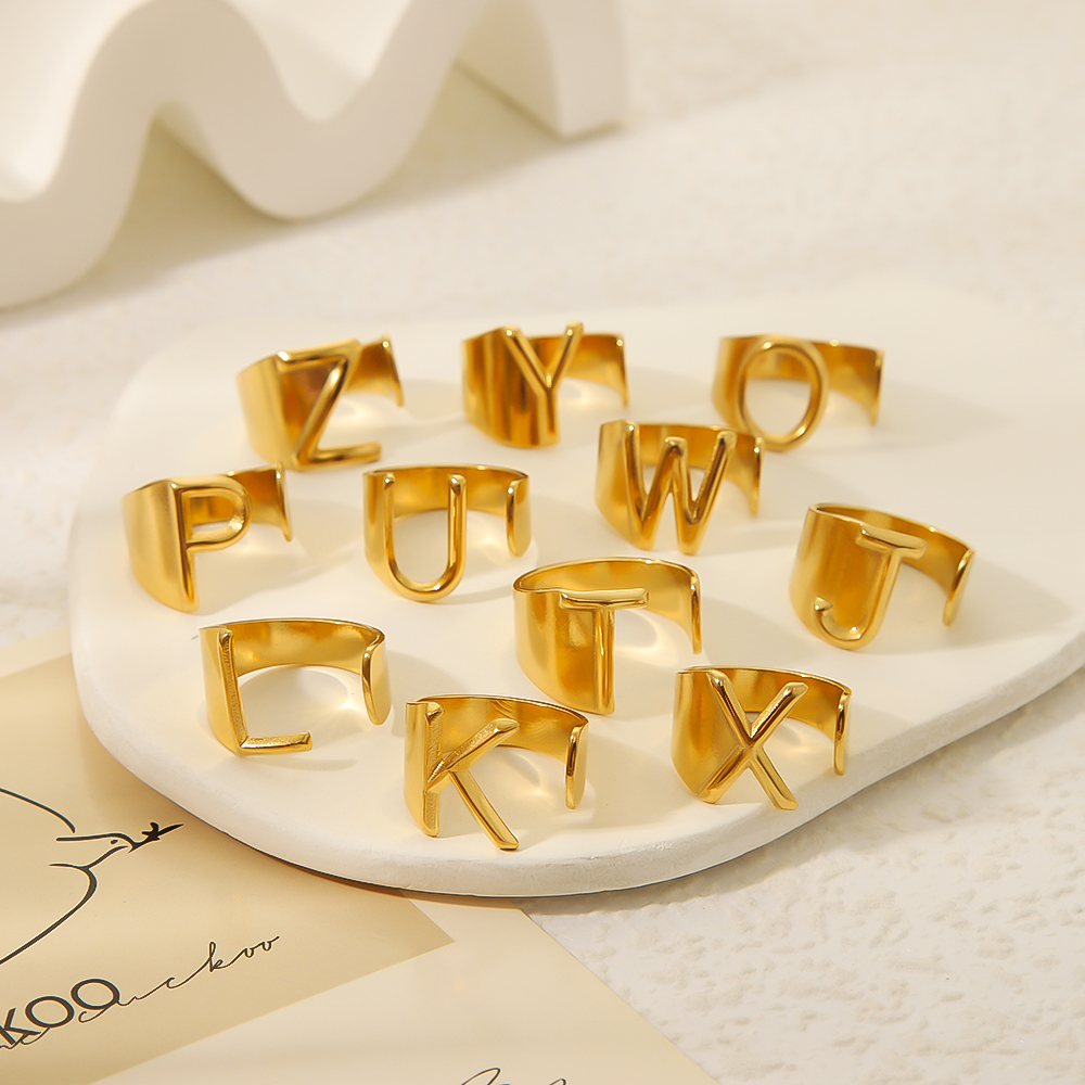 304 Stainless Steel 18K Gold Plated Modern Style Simple Style Asymmetrical Plating Letter Open Rings display picture 4
