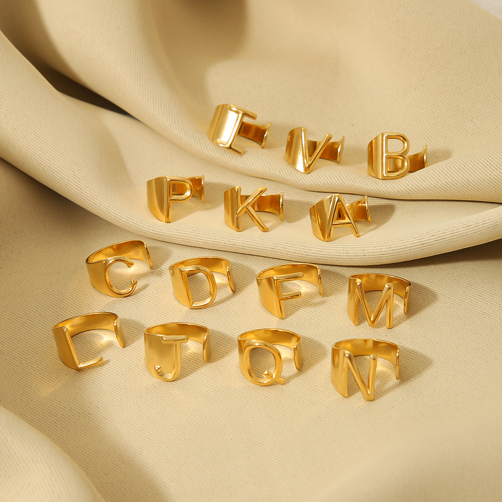 304 Stainless Steel 18K Gold Plated Modern Style Simple Style Asymmetrical Plating Letter Open Rings display picture 5