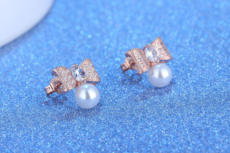 1 Pair Elegant Modern Style Commute Bow Knot Inlay Copper Artificial Pearls Zircon Drop Earrings display picture 2