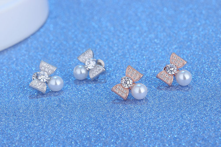 1 Pair Elegant Modern Style Commute Bow Knot Inlay Copper Artificial Pearls Zircon Drop Earrings display picture 3