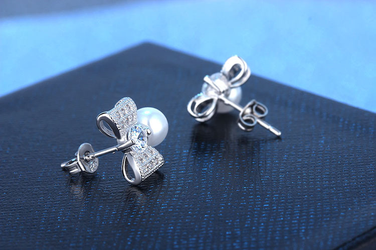 1 Paar Elegant Moderner Stil Pendeln Bogenknoten Inlay Kupfer Künstliche Perlen Zirkon Tropfenohrringe display picture 5