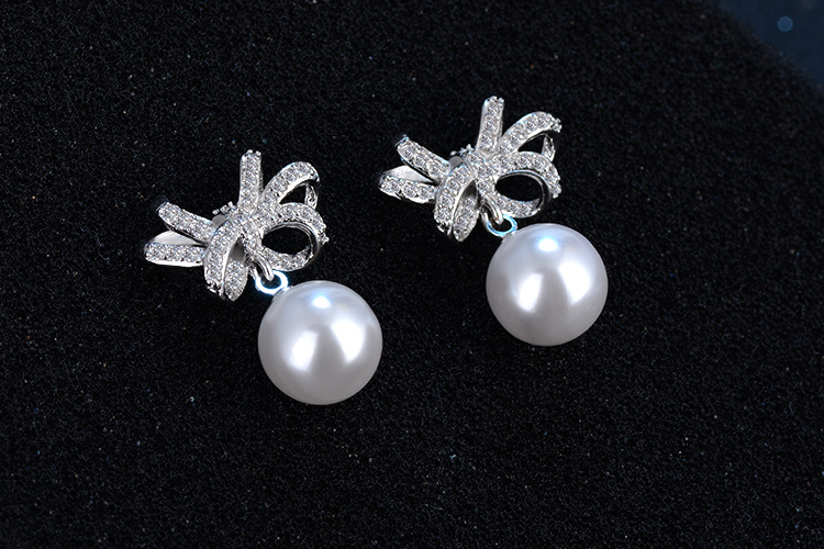 1 Pair Cute Sweet Bow Knot Plating Inlay Copper Pearl Zircon White Gold Plated Drop Earrings display picture 4