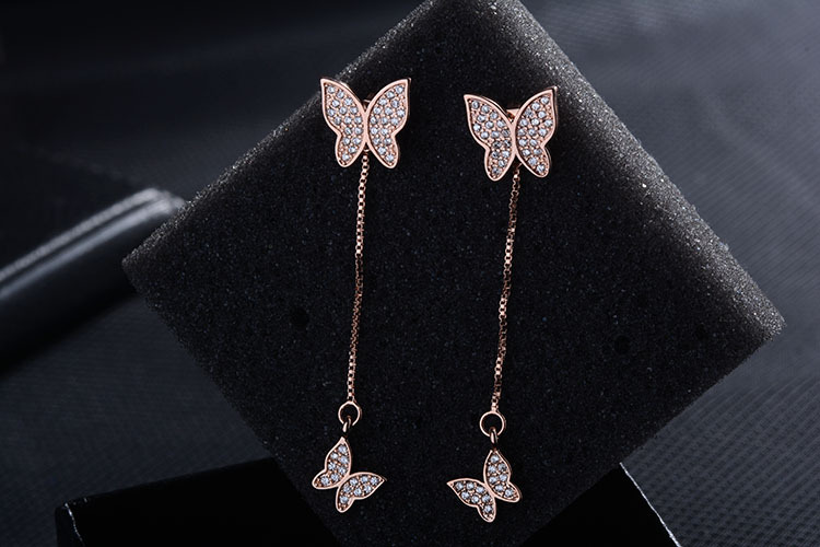 1 Pair Simple Style Shiny Butterfly Chain Inlay Copper Zircon Drop Earrings display picture 5