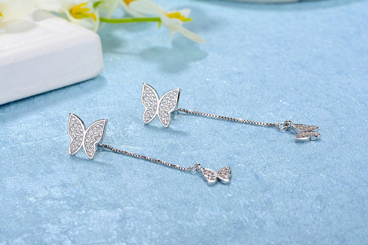 1 Pair Simple Style Shiny Butterfly Chain Inlay Copper Zircon Drop Earrings display picture 9