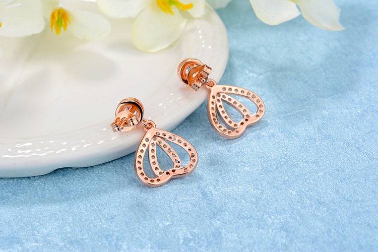 1 Pair Simple Style Shiny Heart Shape Hollow Out Inlay Copper Zircon Rose Gold Plated White Gold Plated Drop Earrings display picture 9