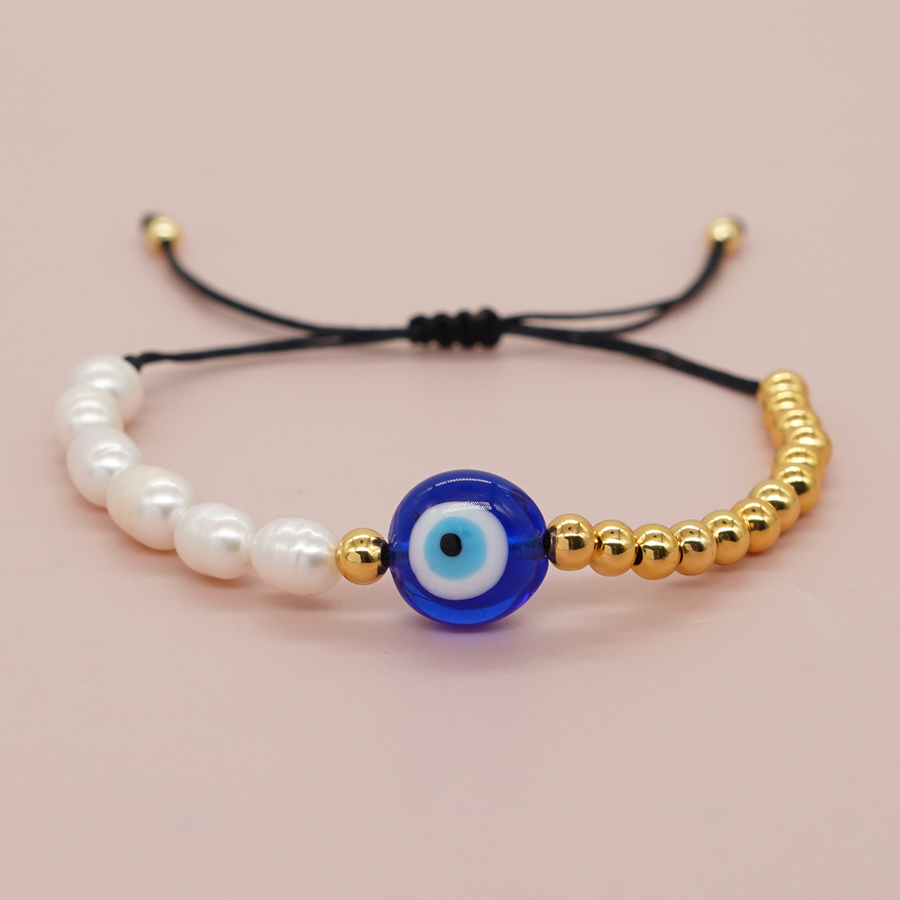 Bohemian Geometric Eye Imitation Pearl Rope Copper Knitting Women's Drawstring Bracelets display picture 3