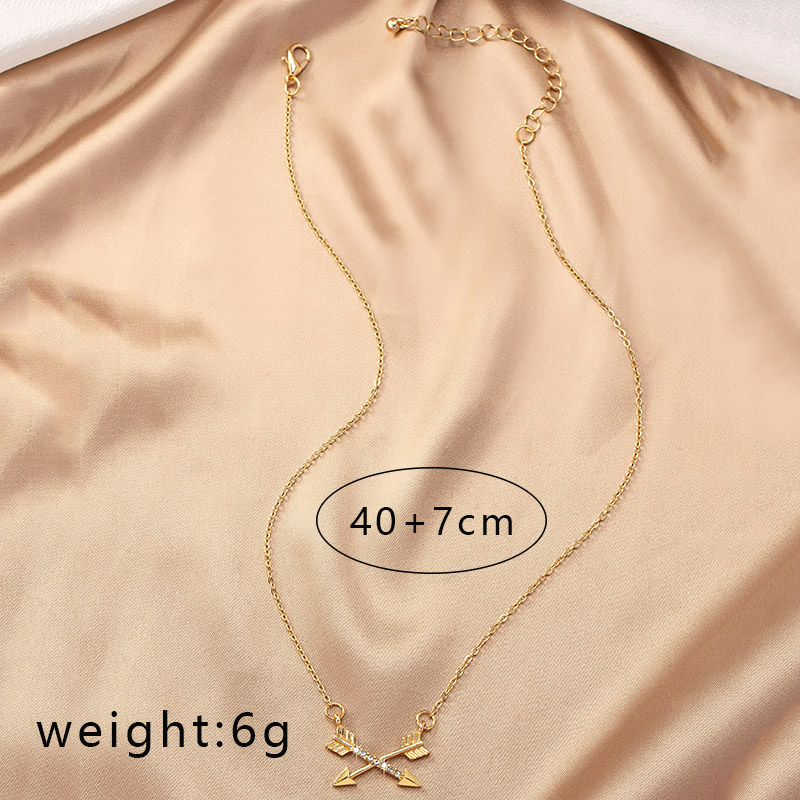 Simple Style Bow And Arrow Alloy Plating Inlay Rhinestones Gold Plated Women's Pendant Necklace display picture 5
