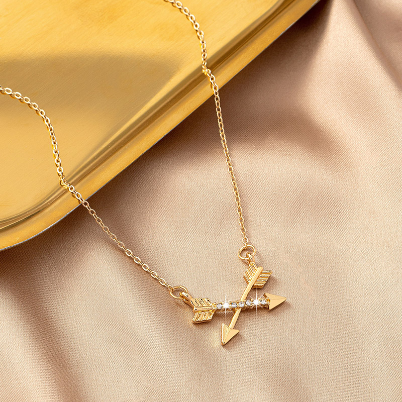 Simple Style Bow And Arrow Alloy Plating Inlay Rhinestones Gold Plated Women's Pendant Necklace display picture 2