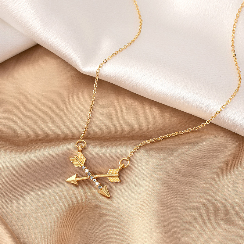 Simple Style Bow And Arrow Alloy Plating Inlay Rhinestones Gold Plated Women's Pendant Necklace display picture 3
