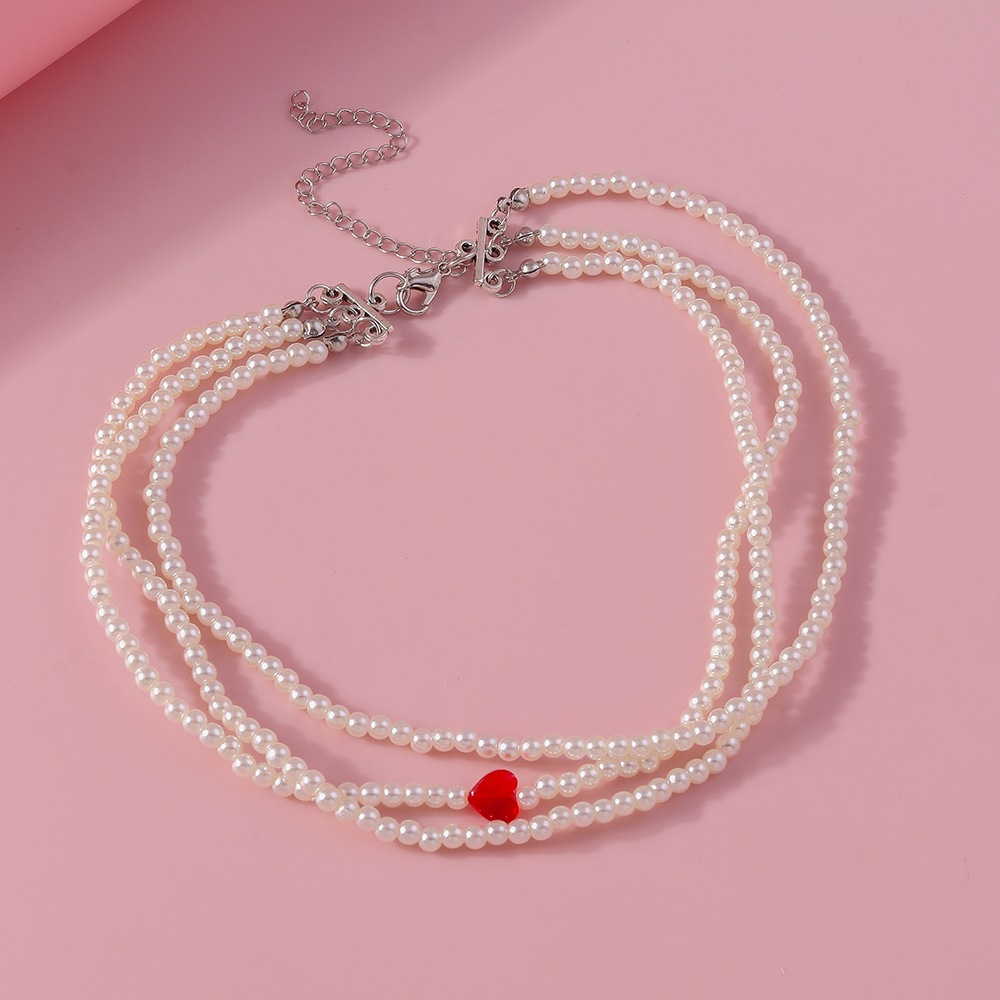 Simple Style Classic Style Heart Shape Artificial Pearl Zinc Alloy Beaded Women's Layered Necklaces display picture 3