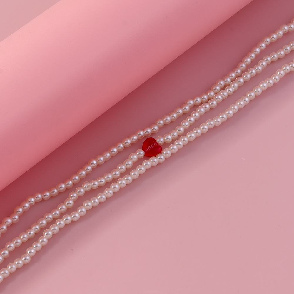 Einfacher Stil Klassischer Stil Herzform Künstliche Perle Zinklegierung Perlen Frau Geschichtete Halskette display picture 4