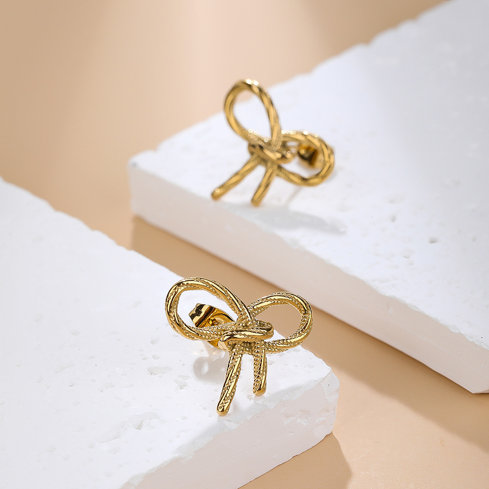 1 Pair Simple Style Classic Style Solid Color Bow Knot Plating Titanium Steel 18k Gold Plated Ear Studs display picture 1