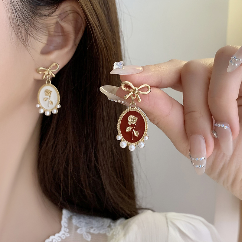 1 Pair Vintage Style Bow Knot Enamel Plating Inlay Alloy Artificial Pearls Gold Plated Drop Earrings display picture 2