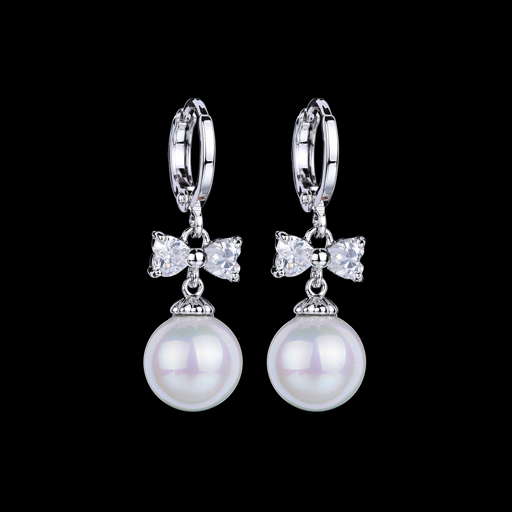 1 Pair Elegant Cute Simple Style Round Bow Knot Polishing Plating Inlay Copper Copper Alloy Artificial Pearls Zircon White Gold Plated Drop Earrings display picture 1