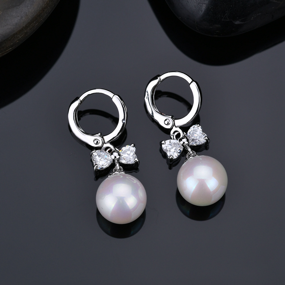 1 Pair Elegant Cute Simple Style Round Bow Knot Polishing Plating Inlay Copper Copper Alloy Artificial Pearls Zircon White Gold Plated Drop Earrings display picture 2