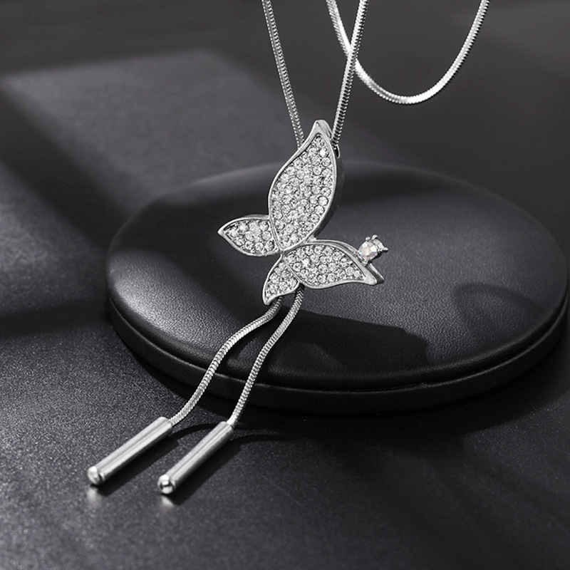 Simple Style Butterfly Alloy Copper Inlay Glass Women's Sweater Chain Long Necklace display picture 6