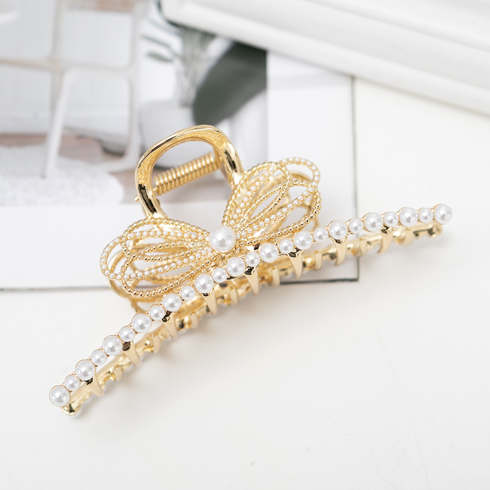 Women's Simple Style Bow Knot Metal Plating Hair Claws display picture 5