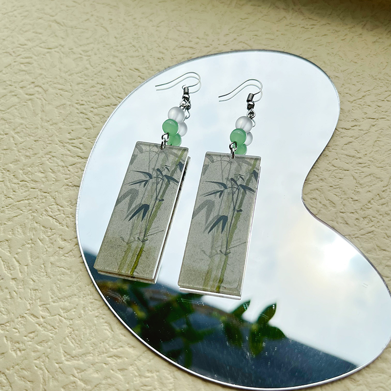 1 Pair Simple Style Commute Bamboo Flower Printing Polishing Arylic Silver Plated Drop Earrings display picture 6