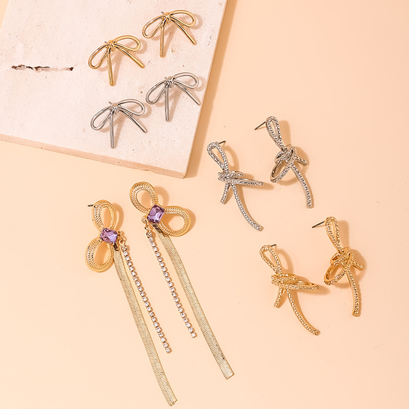 1 Pair Sweet Simple Style Bow Knot Inlay Alloy Rhinestones Drop Earrings Ear Studs display picture 1
