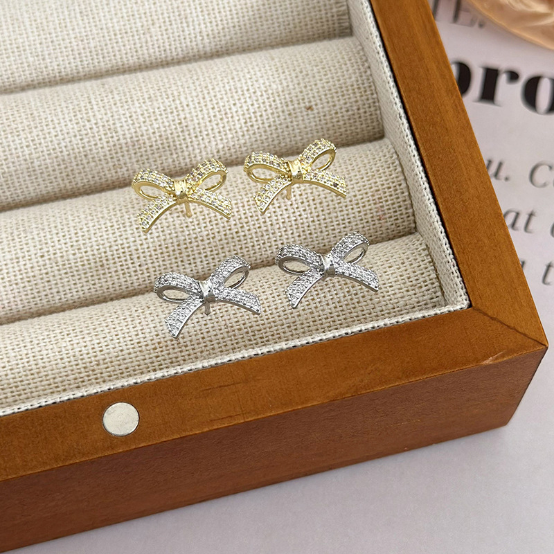1 Pair Simple Style Bow Knot Copper Ear Studs display picture 7