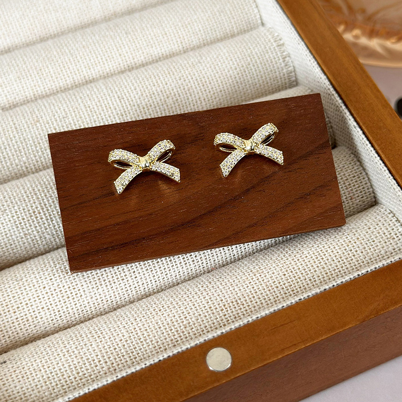 1 Pair Simple Style Bow Knot Copper Ear Studs display picture 9