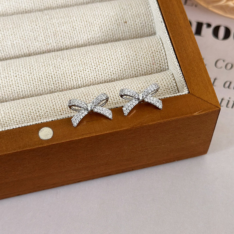 1 Pair Simple Style Bow Knot Copper Ear Studs display picture 12