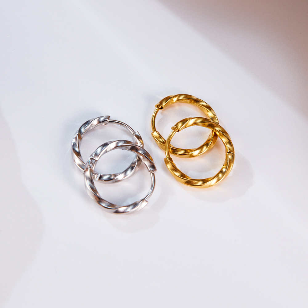 1 Pair Casual Modern Style Spiral Stripe Irregular Metal Stainless Steel Hoop Earrings display picture 6