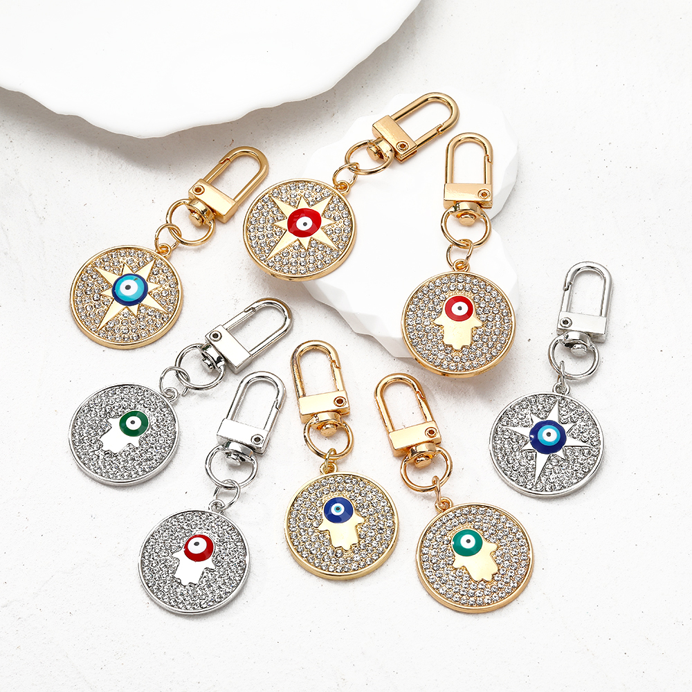 Vintage Style Simple Style Classic Style Round Devil's Eye Palm Alloy Inlay Rhinestones Bag Pendant Keychain display picture 9