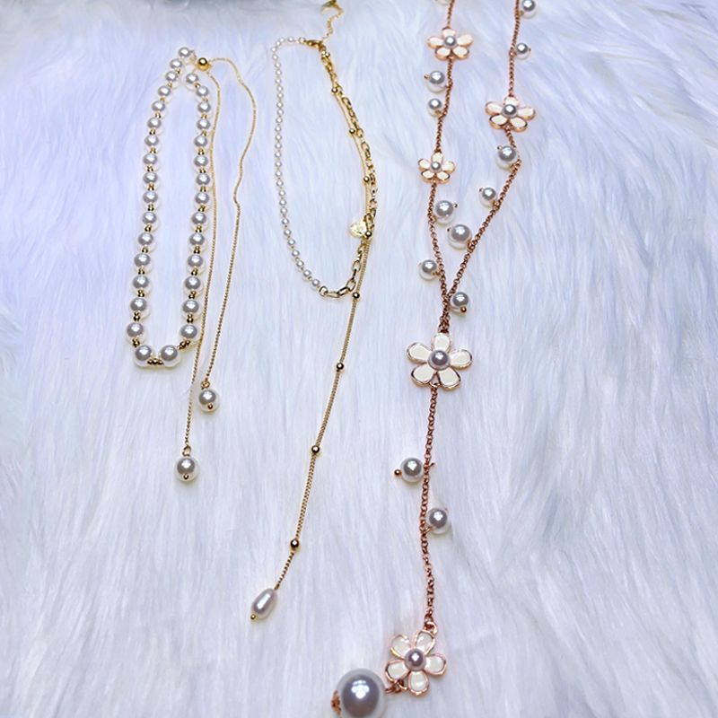 Elegant Flower Copper Alloy Inlay Pearl Pendant Necklace Sweater Chain display picture 1