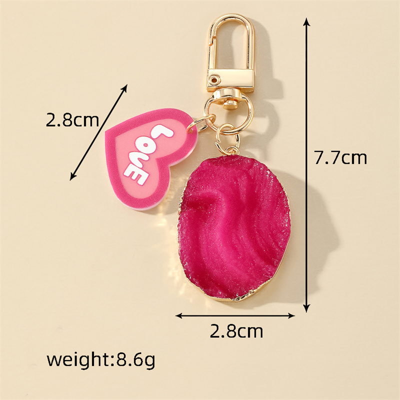 Cute Simple Style Heart Shape Resin Unisex Keychain display picture 10