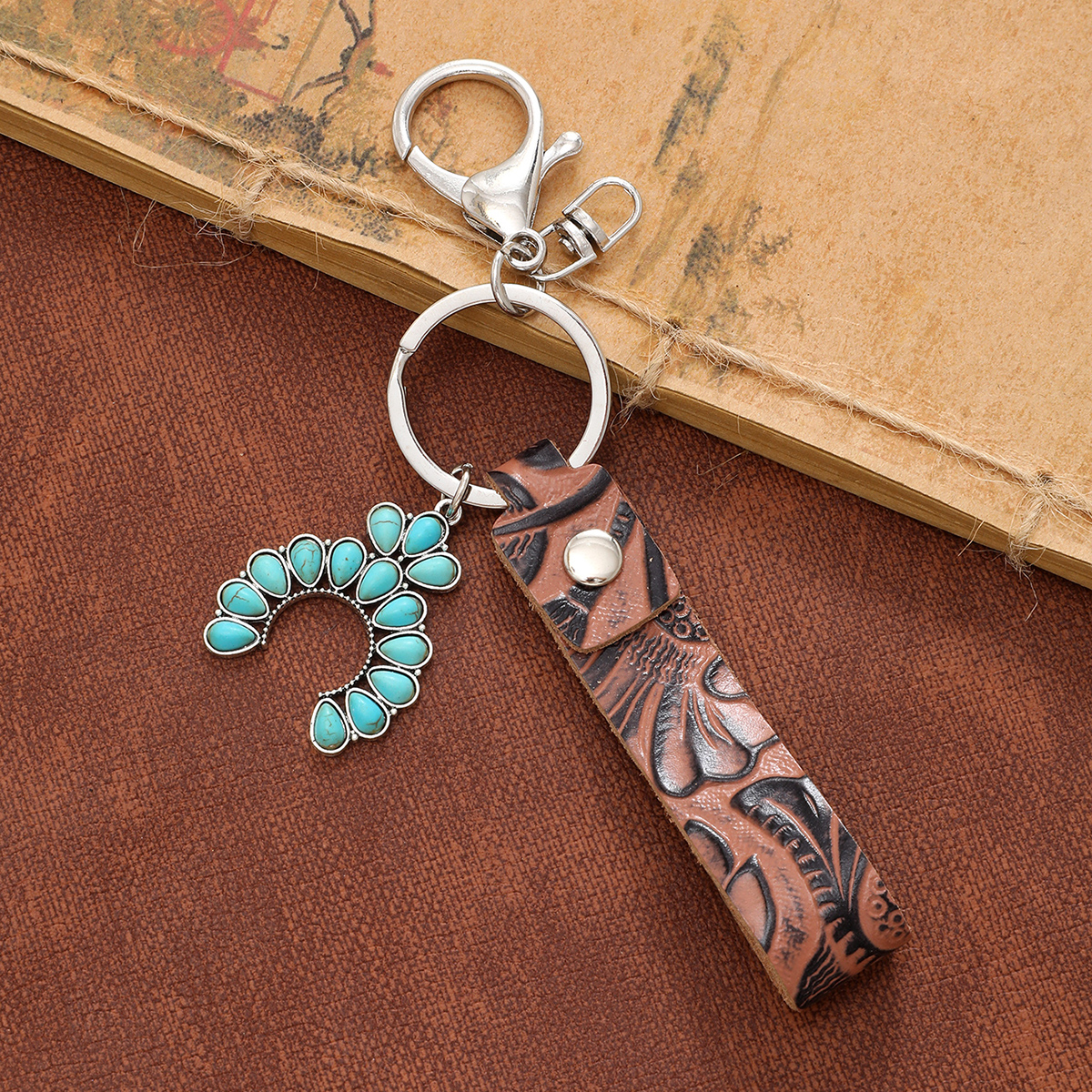 Simple Style Cactus Leaf Dreamcatcher Pu Leather Alloy Turquoise Bag Pendant Keychain display picture 2