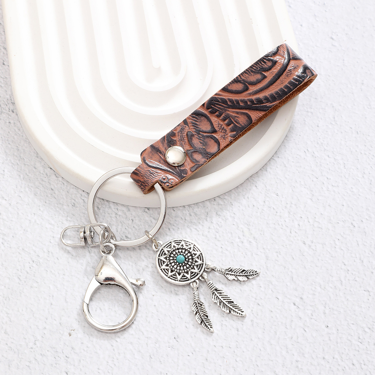 Simple Style Cactus Leaf Dreamcatcher Pu Leather Alloy Turquoise Bag Pendant Keychain display picture 6