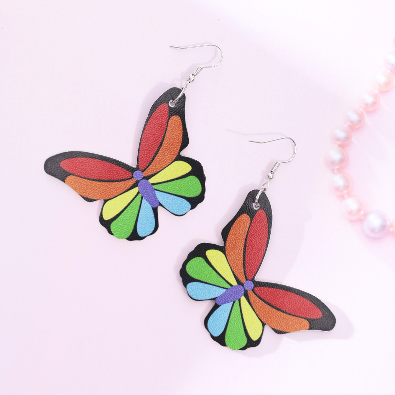 1 Paar Moderner Stil Einfacher Stil Regenbogen Herzform Schmetterling Pu-leder Tropfenohrringe Ohrstecker display picture 8