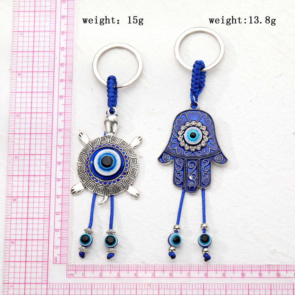 Casual Vintage Style Simple Style Tortoise Devil's Eye Palm Alloy Beaded Inlay Rhinestones Bag Pendant Keychain display picture 4