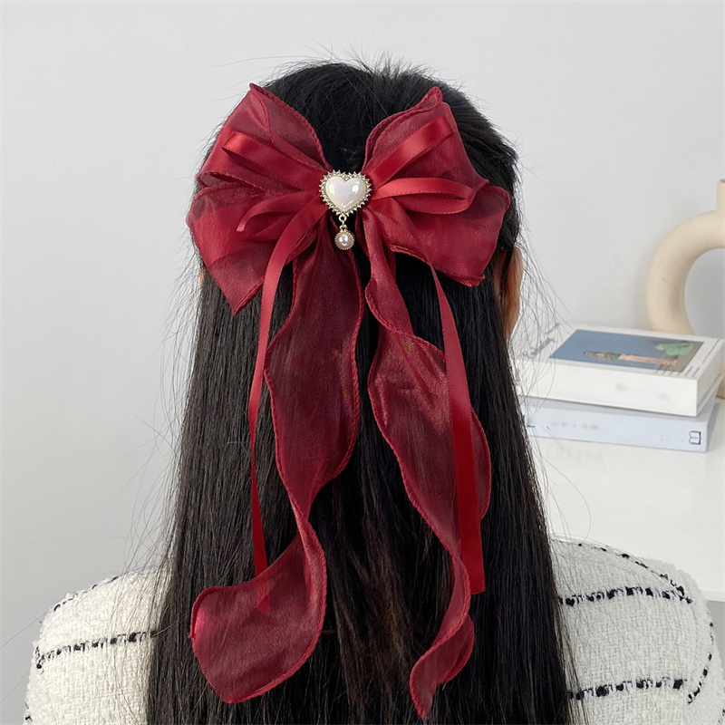 Women's Sweet Solid Color Bow Knot Cloth Hair Clip display picture 7