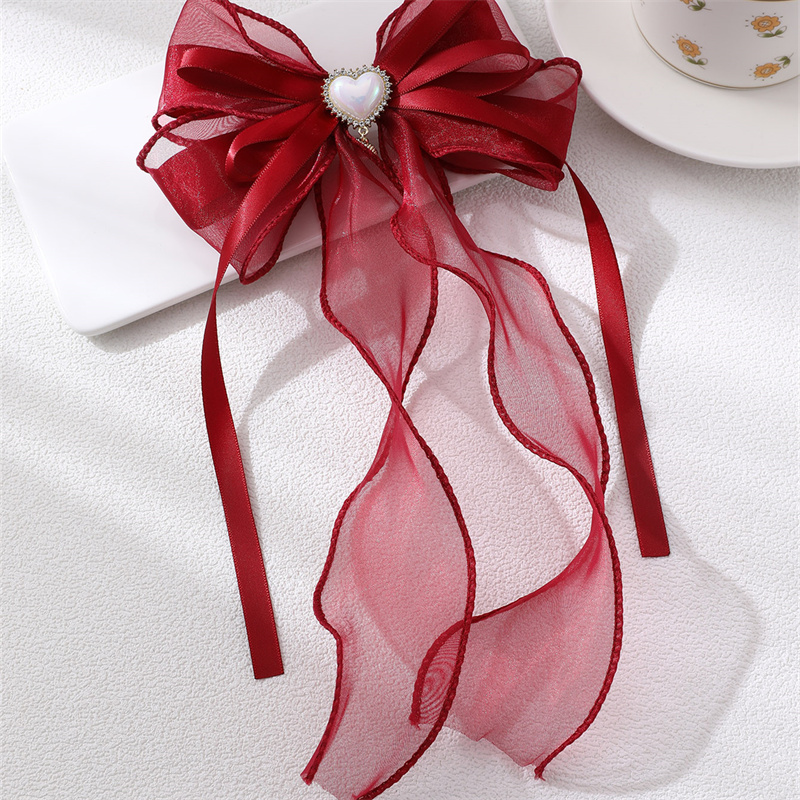 Women's Sweet Solid Color Bow Knot Cloth Hair Clip display picture 8