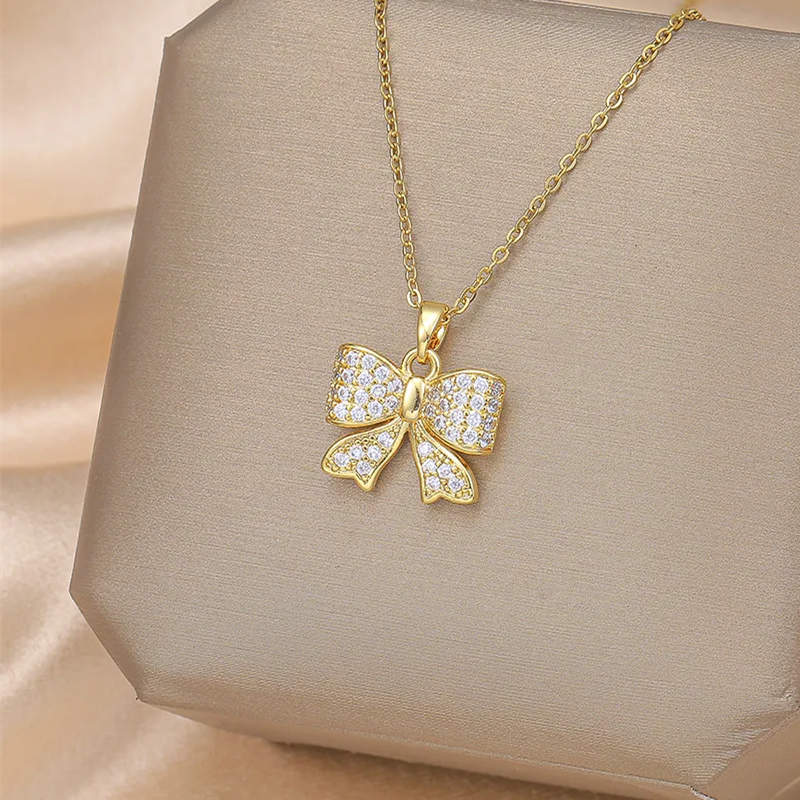 Wholesale IG Style Simple Style Electrocardiogram Wings Bow Knot 201 Stainless Steel Copper Plating Inlay Opal Zircon Pendant Necklace display picture 4