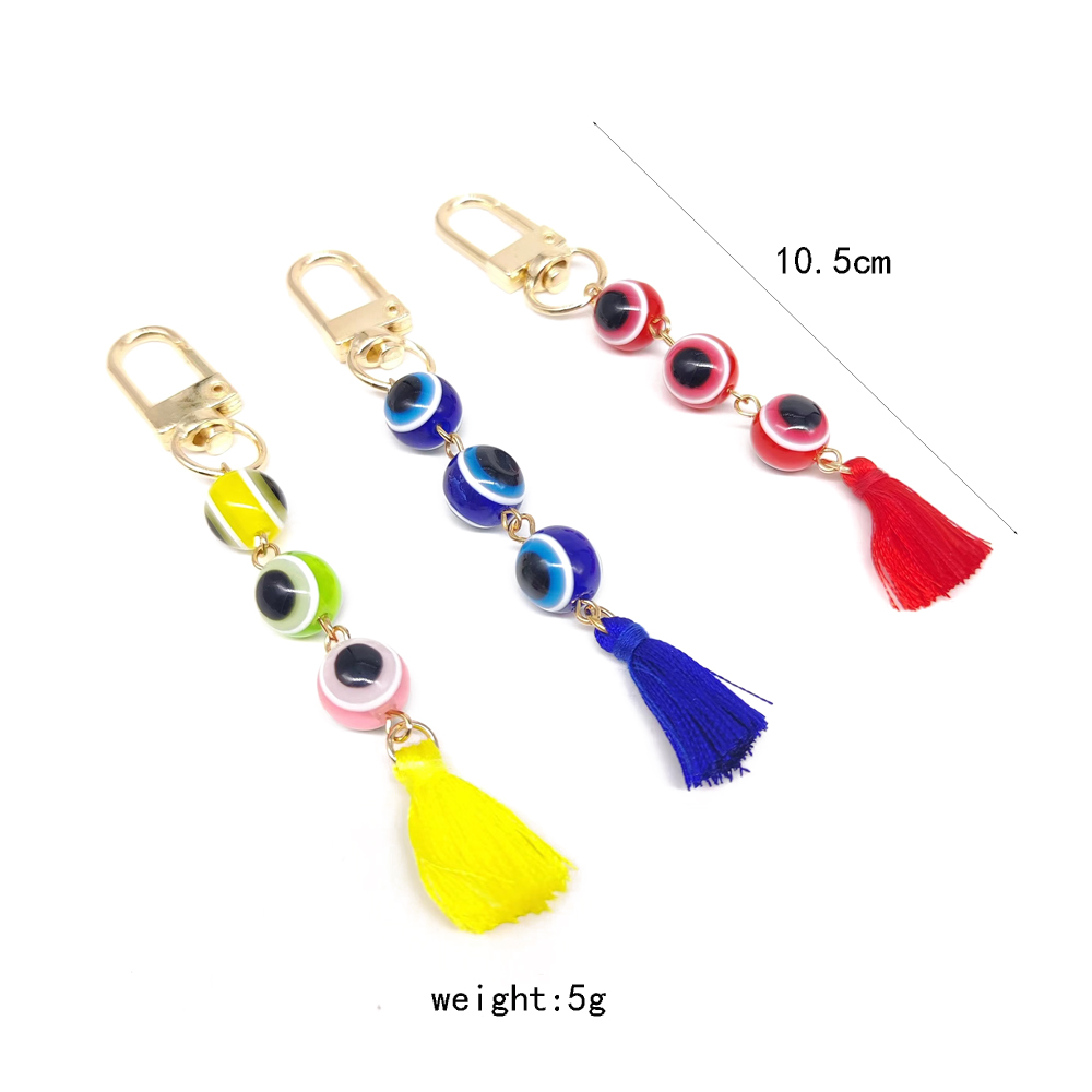 Simple Style Devil's Eye Alloy Resin Tassel Plating Gold Plated Bag Pendant Keychain display picture 5