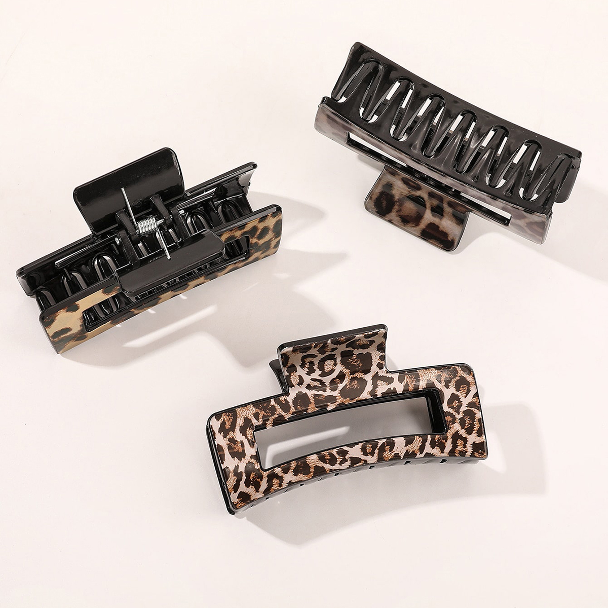 Frau Einfacher Stil Pendeln Leopard Kunststoff Aushöhlen Haarkrallen display picture 1
