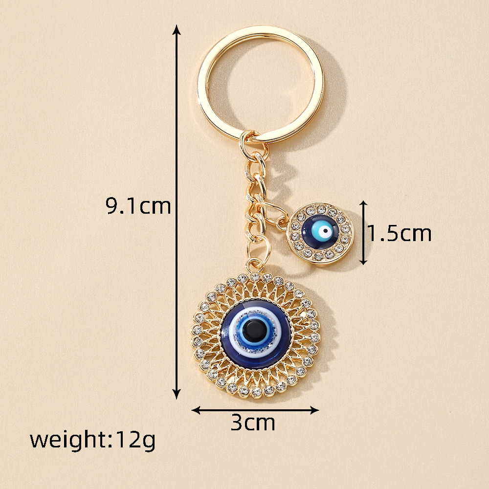 Casual Vintage Style Simple Style Devil's Eye Heart Shape Alloy Inlay Rhinestones Bag Pendant Keychain display picture 7