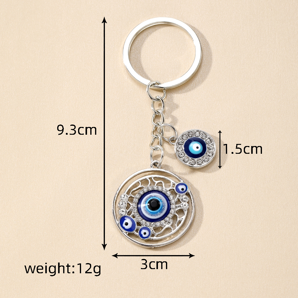 Casual Vintage Style Simple Style Devil's Eye Heart Shape Alloy Inlay Rhinestones Bag Pendant Keychain display picture 9